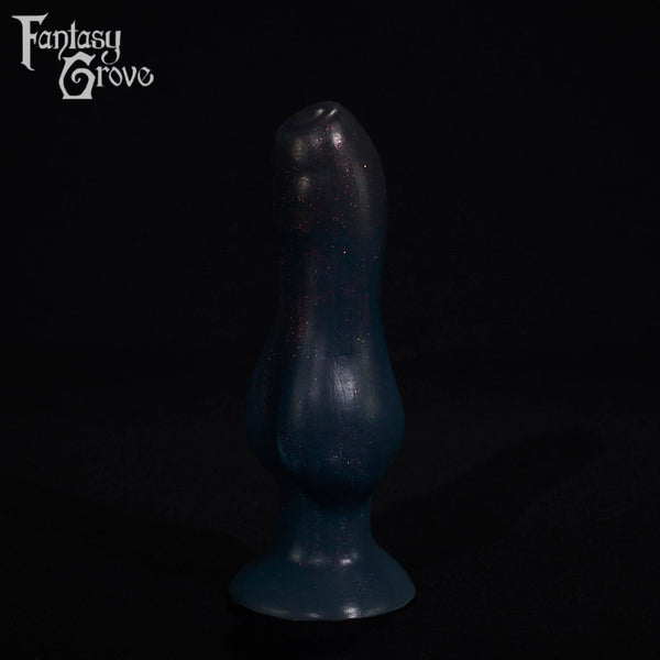 A fantasy sex toy on a black background with the Fantasy Grove logo in the upper left corner