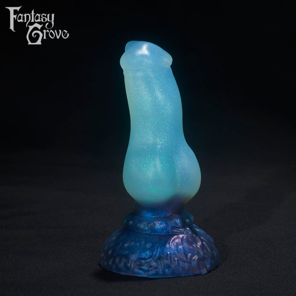 A Fantasy Grove sex toy on a black background with a logo in the upper left corner