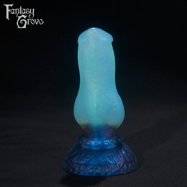 A Fantasy Grove sex toy on a black background with a logo in the upper left corner