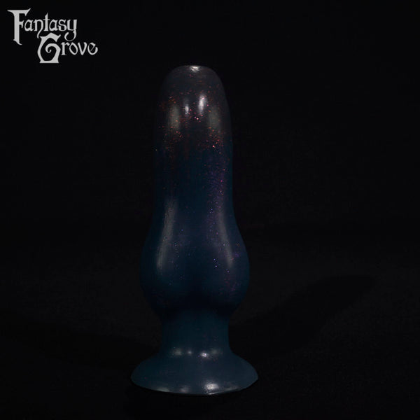 A fantasy sex toy on a black background with the Fantasy Grove logo in the upper left corner