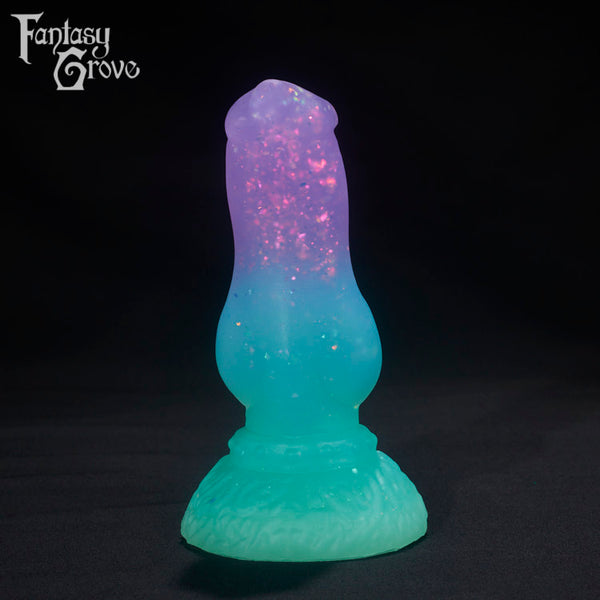 A Fantasy Grove sex toy on a black background with a logo in the upper left corner