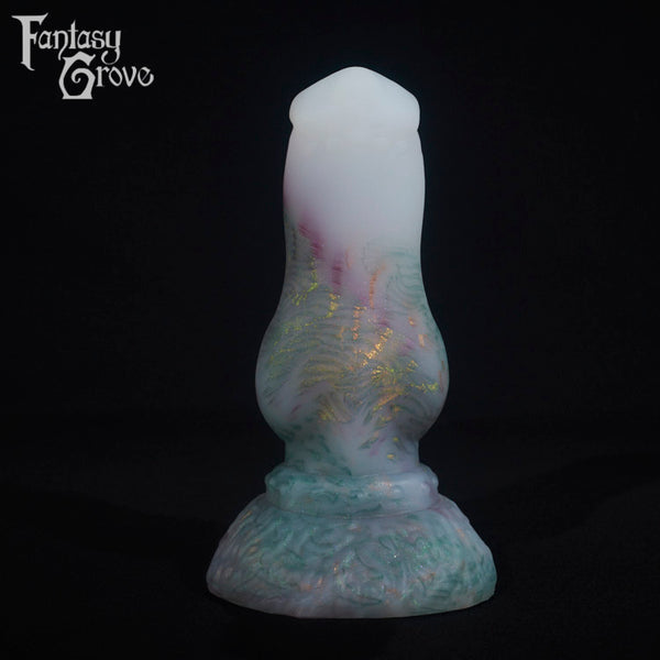 A fantasy sex toy on a black background with the Fantasy Grove logo in the upper left corner