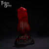 A Fantasy Grove sex toy on a black background with a logo in the upper left corner