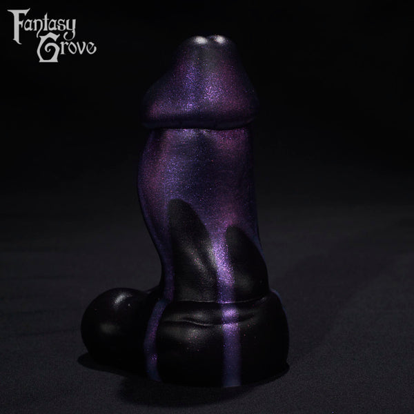 A Fantasy Grove sex toy on a black background with a logo in the upper left corner