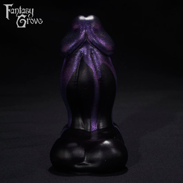 A Fantasy Grove sex toy on a black background with a logo in the upper left corner