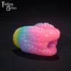 A Fantasy Grove sex toy on a black background with a logo in the upper left corner