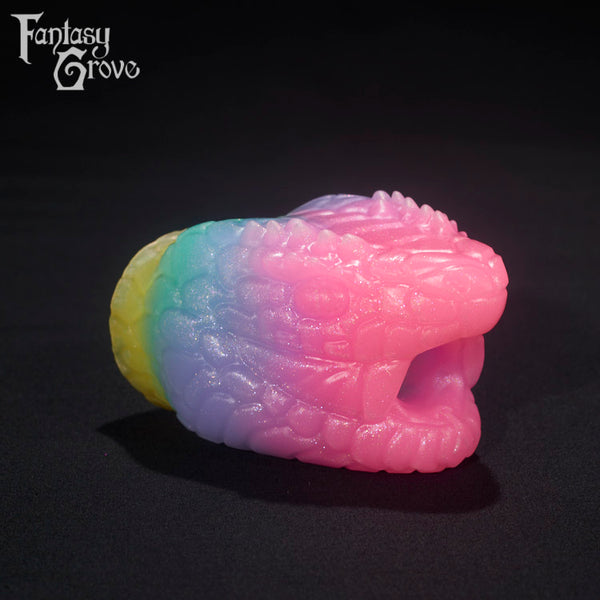 A Fantasy Grove sex toy on a black background with a logo in the upper left corner