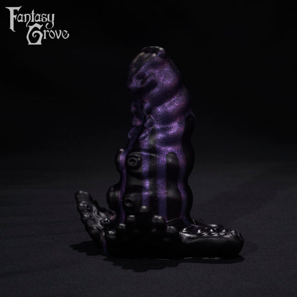 A Fantasy Grove sex toy on a black background with a logo in the upper left corner