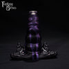 A Fantasy Grove sex toy on a black background with a logo in the upper left corner