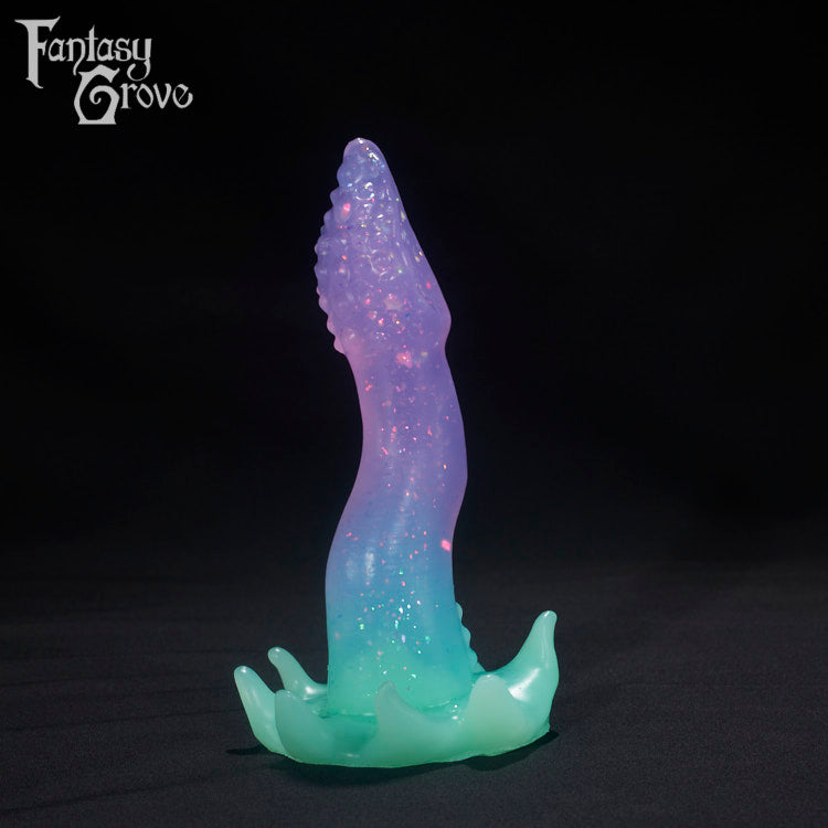 A Fantasy Grove sex toy on a black background with a logo in the upper left corner