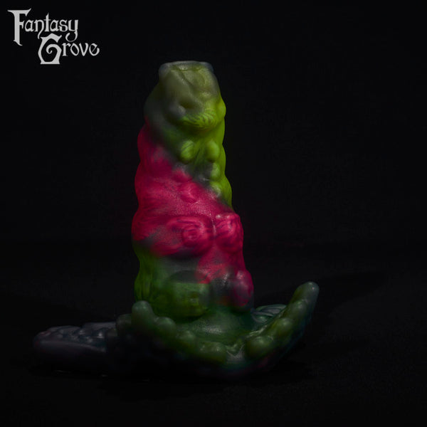A fantasy sex toy on a black background with the Fantasy Grove logo in the upper left corner