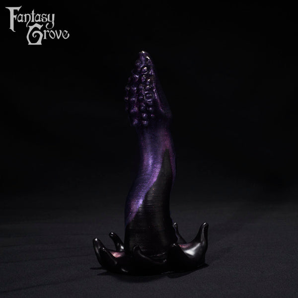 A Fantasy Grove sex toy on a black background with a logo in the upper left corner