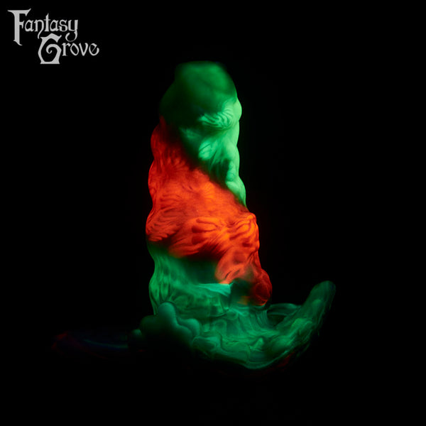 A fantasy sex toy on a black background with the Fantasy Grove logo in the upper left corner