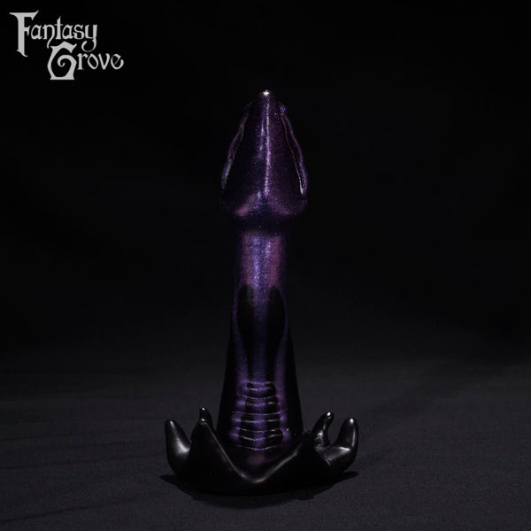 A Fantasy Grove sex toy on a black background with a logo in the upper left corner