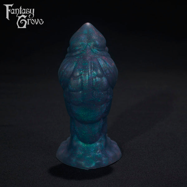 A Fantasy Grove sex toy on a black background with a logo in the upper left corner