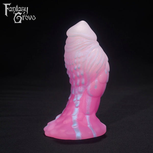 A Fantasy Grove sex toy on a black background with a logo in the upper left corner