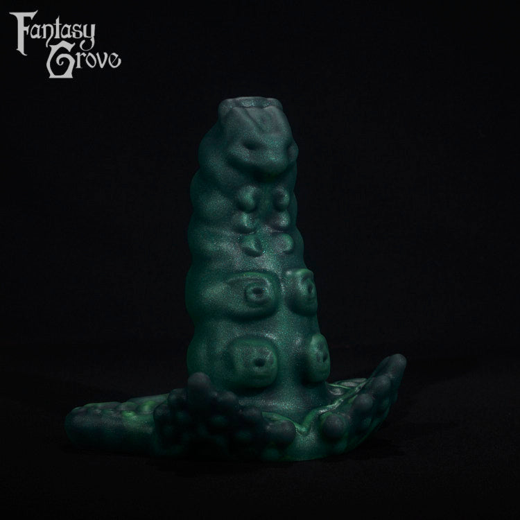 A fantasy sex toy on a black background with the Fantasy Grove logo in the upper left corner