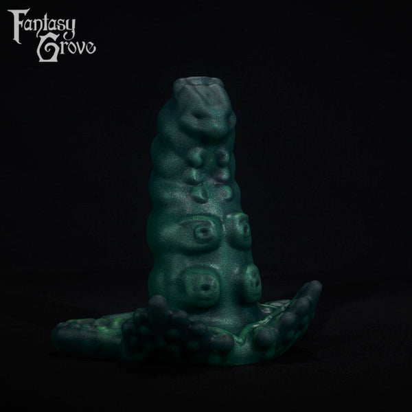 A fantasy sex toy on a black background with the Fantasy Grove logo in the upper left corner