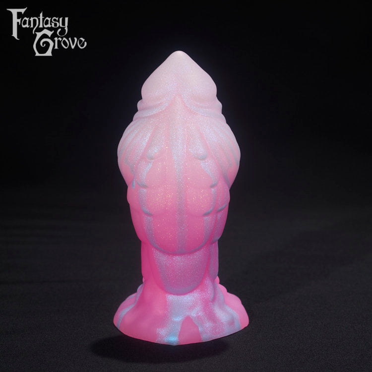 A Fantasy Grove sex toy on a black background with a logo in the upper left corner