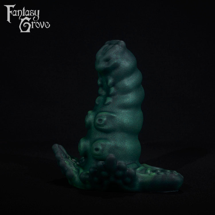 A fantasy sex toy on a black background with the Fantasy Grove logo in the upper left corner