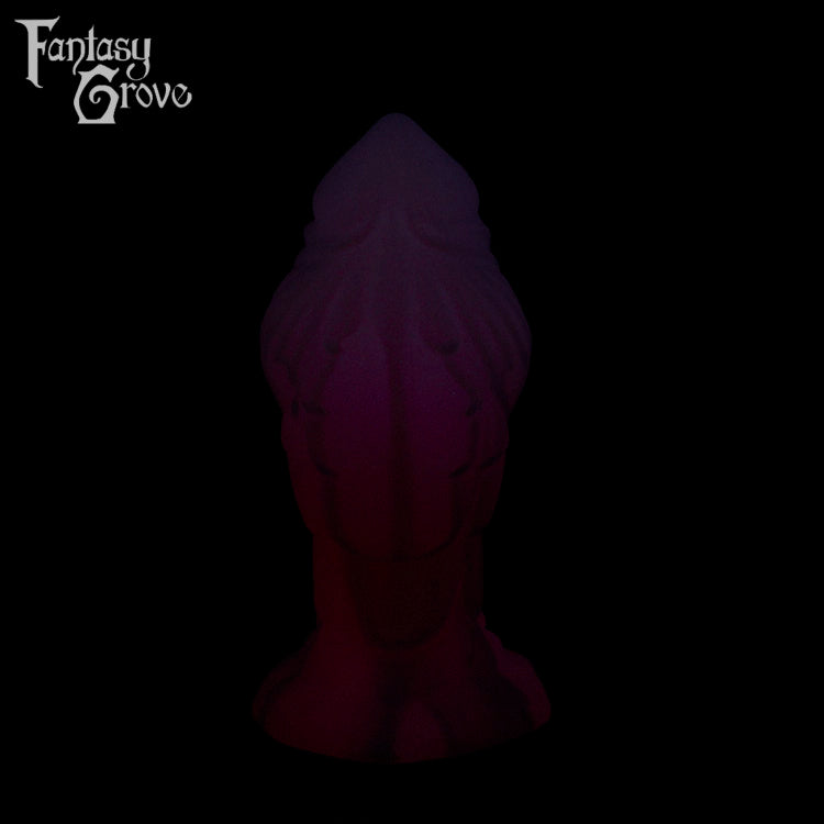 A Fantasy Grove sex toy on a black background with a logo in the upper left corner