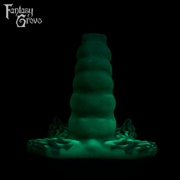 A fantasy sex toy on a black background with the Fantasy Grove logo in the upper left corner