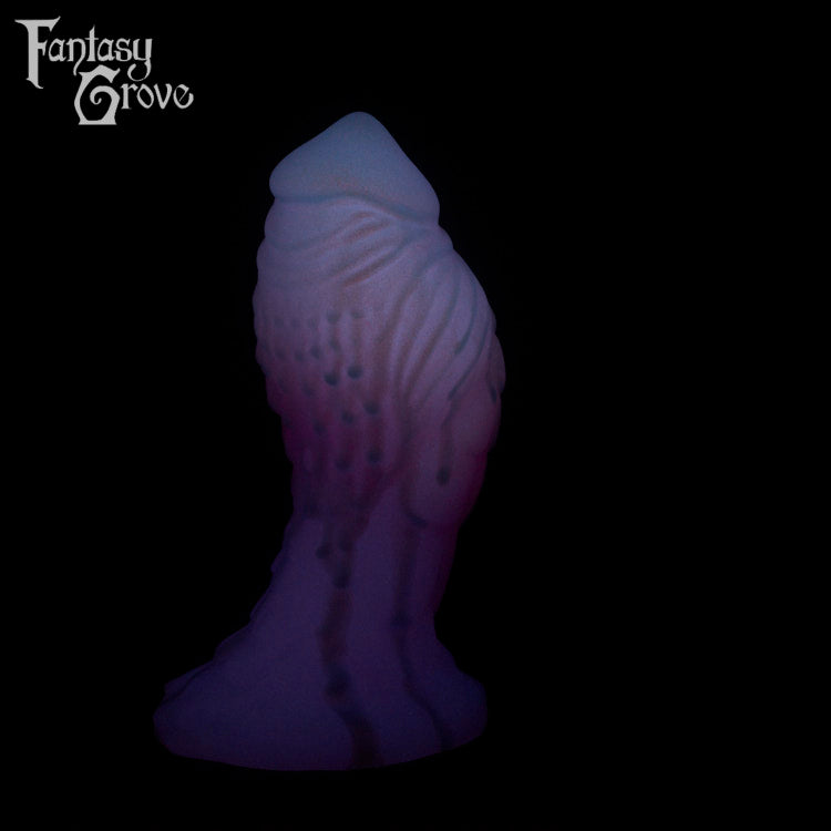 A Fantasy Grove sex toy on a black background with a logo in the upper left corner
