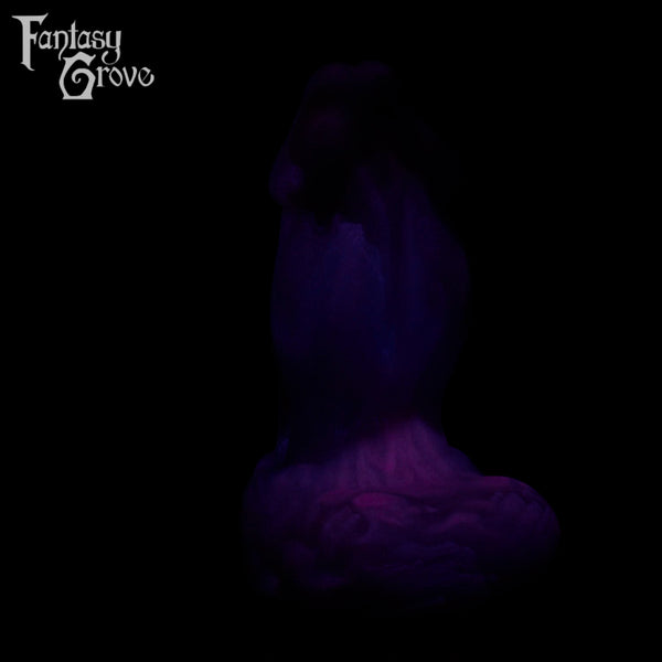 A fantasy sex toys on a black background with Fantasy Grove branding
