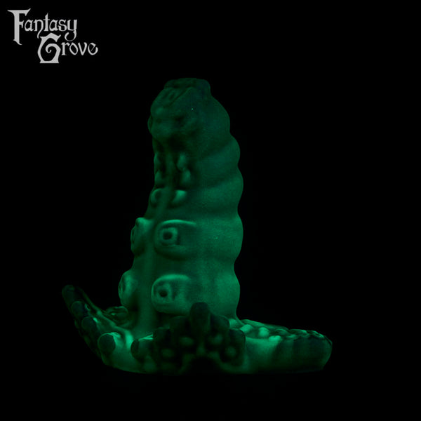 A fantasy sex toy on a black background with the Fantasy Grove logo in the upper left corner