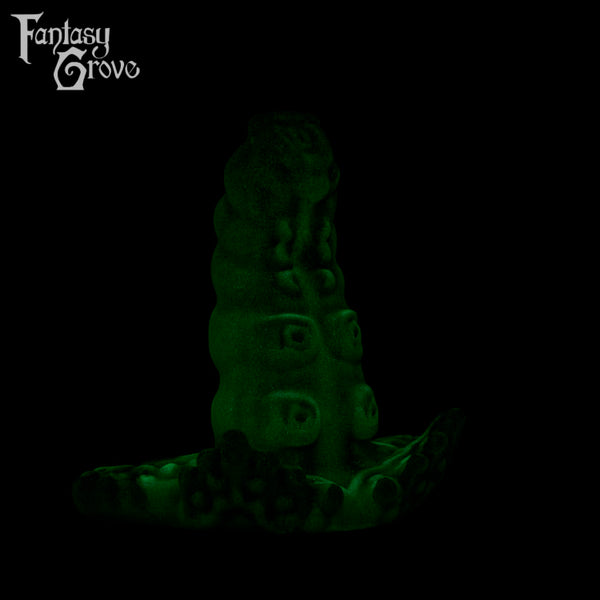 A fantasy sex toy on a black background with the Fantasy Grove logo in the upper left corner