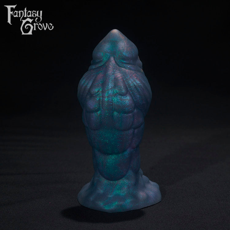 A Fantasy Grove sex toy on a black background with a logo in the upper left corner