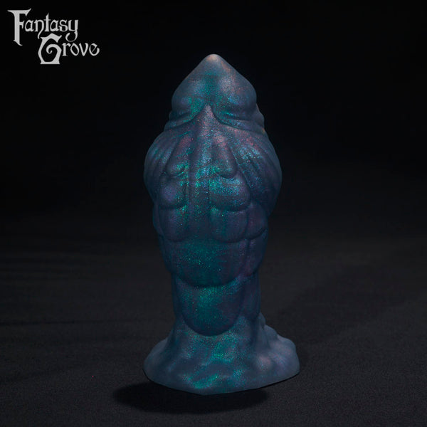 A Fantasy Grove sex toy on a black background with a logo in the upper left corner