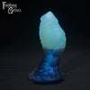 A Fantasy Grove sex toy on a black background with a logo in the upper left corner