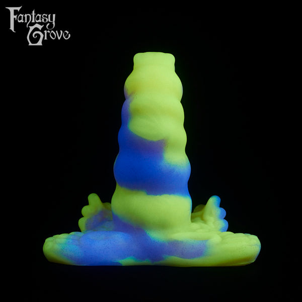 A fantasy sex toy on a black background with the Fantasy Grove logo in the upper left corner