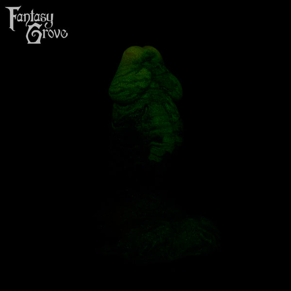 A fantasy sex toy on a black background with the Fantasy Grove logo in the upper left corner 