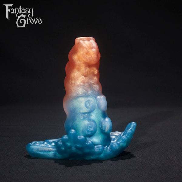 A fantasy sex toy on a black background with the Fantasy Grove logo in the upper left corner 