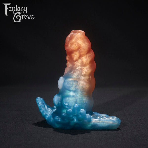 A fantasy sex toy on a black background with the Fantasy Grove logo in the upper left corner 