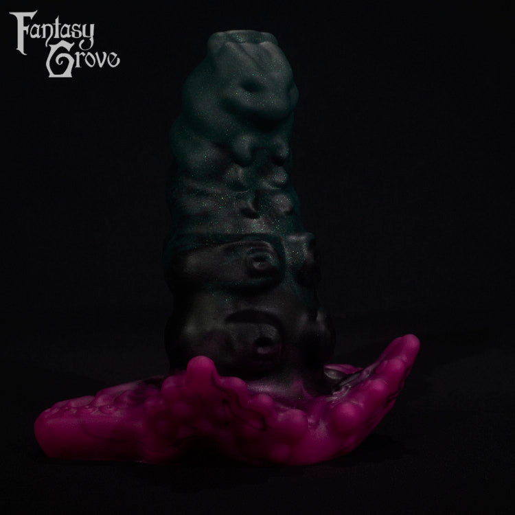 A fantasy sex toy on a black background with the Fantasy Grove logo in the upper left corner