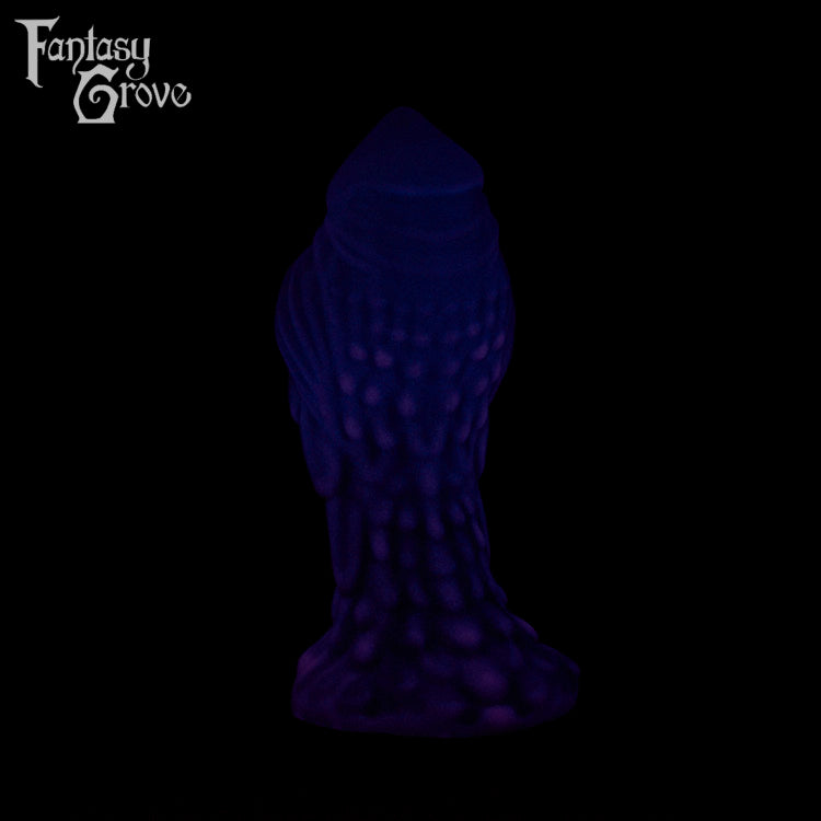 A Fantasy Grove sex toy on a black background with a logo in the upper left corner