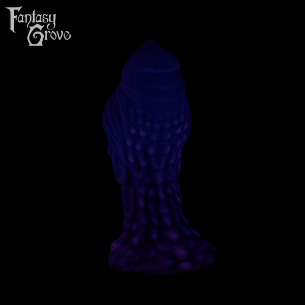 A Fantasy Grove sex toy on a black background with a logo in the upper left corner