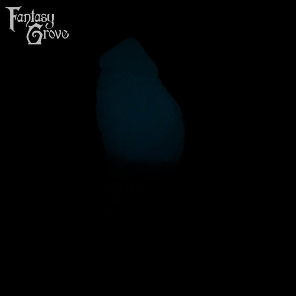 A Fantasy Grove sex toy on a black background with a logo in the upper left corner