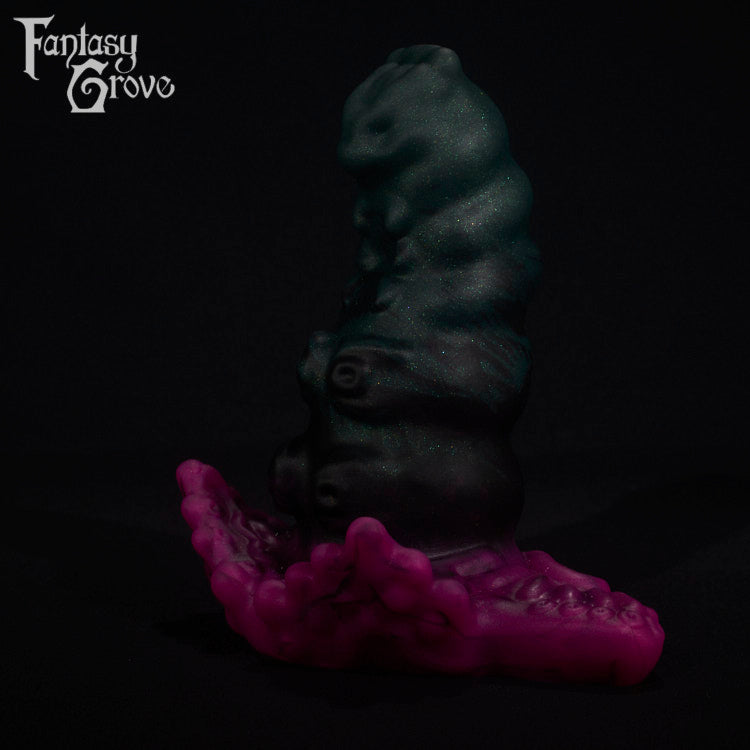 A fantasy sex toy on a black background with the Fantasy Grove logo in the upper left corner