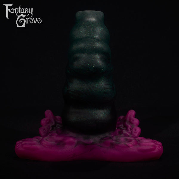 A fantasy sex toy on a black background with the Fantasy Grove logo in the upper left corner