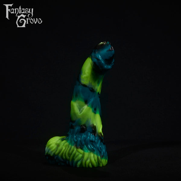 A fantasy sex toy on a black background with the Fantasy Grove logo in the upper left corner