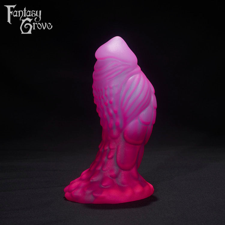A Fantasy Grove sex toy on a black background with a logo in the upper left corner