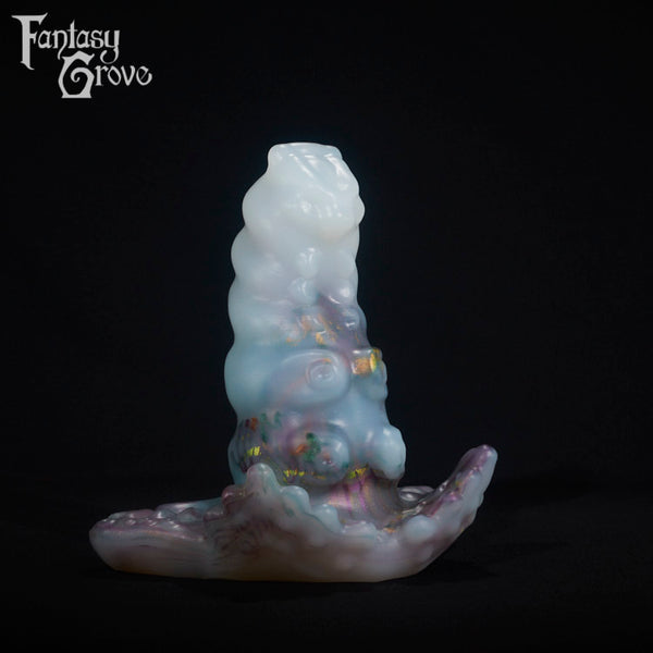 A fantasy sex toy on a black background with the Fantasy Grove logo in the upper left corner