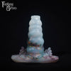 A fantasy sex toy on a black background with the Fantasy Grove logo in the upper left corner