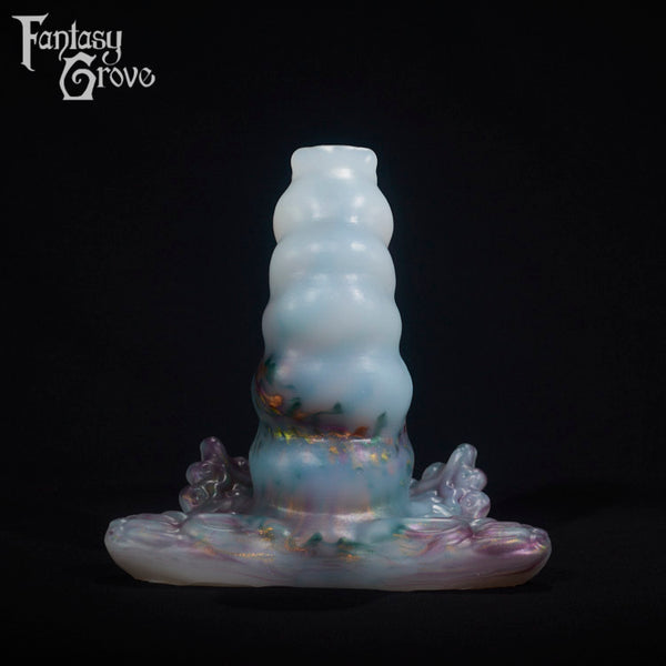 A fantasy sex toy on a black background with the Fantasy Grove logo in the upper left corner