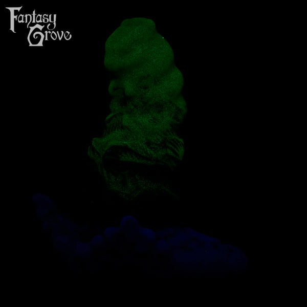 A fantasy sex toy on a black background with the Fantasy Grove logo in the upper left corner