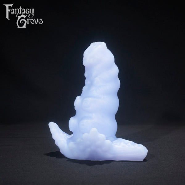 A fantasy sex toy on a black background with the Fantasy Grove logo in the upper left corner 